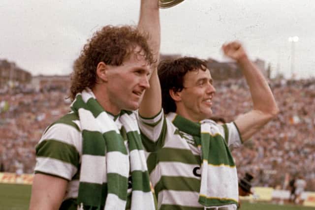 Frank McGarvey and Davie Provan hold aloft the Scottish Cup in 1985 after defeating Dundee Utd in the final. Picture: TSPL