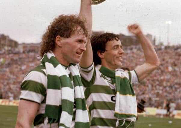 Frank McGarvey and Davie Provan hold aloft the Scottish Cup in 1985 after defeating Dundee Utd in the final. Picture: TSPL