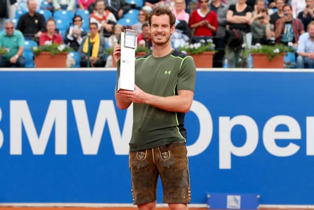 Murray poses in a traditional bavarain Lederhosen after winning the BMW Open finale. Picture: Getty