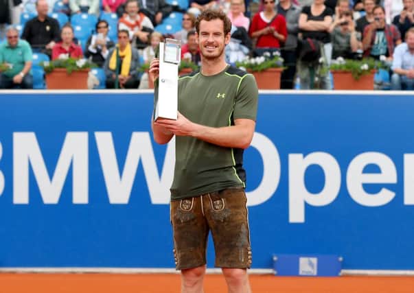 Murray poses in a traditional bavarain Lederhosen after winning the BMW Open finale. Picture: Getty