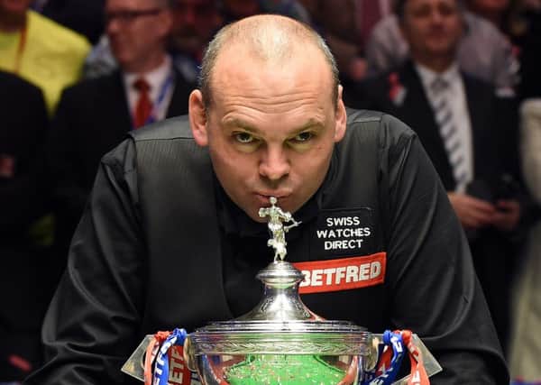 Stuart Bingham celebrates beating Shaun Murphy in the World Championship Snooker final. Picture: AFP/Getty