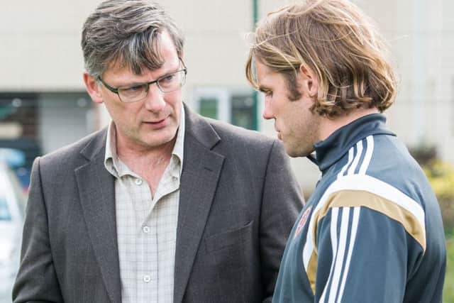 Craig Levein, left, believes Robbie Neilsons true test has yet to come. Picture: Ian Georgeson