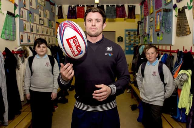 James Fleming at Mount Vernon Primary School yesterday to promote the Emirates Airlines Glasgow 7s. Picture: SNS Group/SRU