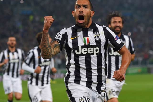 Juventus forward Carlos Tevez celebrates after scoring their second goal. Picture: Getty