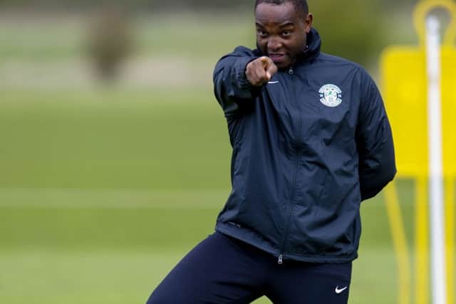 Benni McCarthy gets involved at Hibernian's East Mains training complex. Picture: SNS