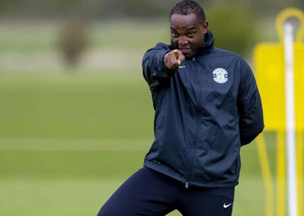 Benni McCarthy gets involved at Hibernian's East Mains training complex. Picture: SNS