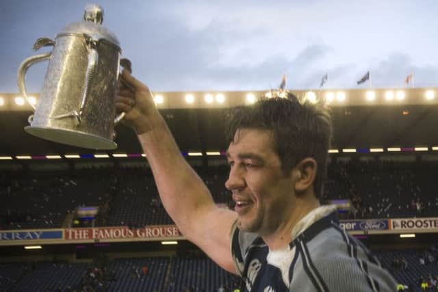 Hines celebrates with the Calcutta Cup after Scotland beat England 15-9 at Murrayfield in 2008. Picture: Ian Georgeson