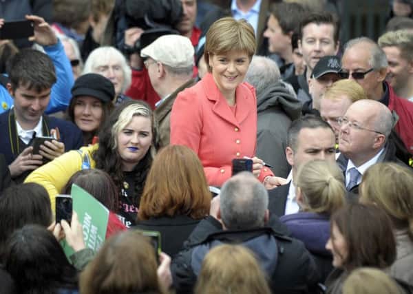 Nicola Sturgeon is surrounded by SNP supporters during a campaign stop in Edinburgh. Picture: Getty