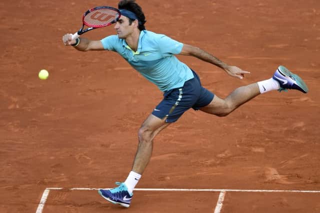 Roger Federer on his way to defeat against Nick Kyrgios in Madrid last night. Picture: AP