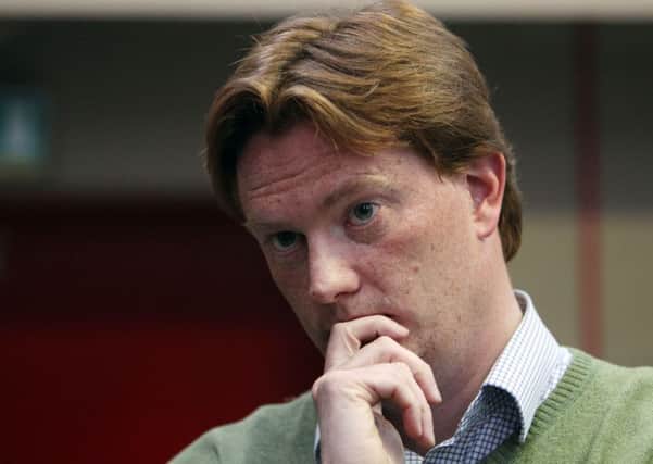 Lib Dem candidate Danny Alexander during a visit to Tomatin Distillery on the last day of election campaigning. Picture: PA