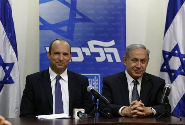Benjamin Netanyahu, right, and the head of the right-wing Jewish Home party, Naftali Bennett. Picture: Getty
