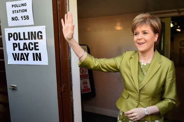 Nicola Sturgeon votes with her husband Peter Murrell in Glasgow. Picture: Getty