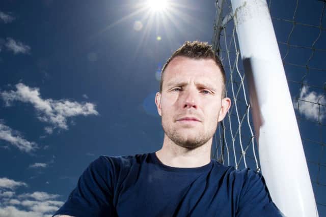 Andy Dowie, who began his career at Rangers, has signed a new one-year deal with Queens. Picture: SNS
