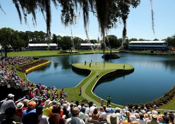 The infamous 17th at Sawgrass which was safely negotiated by Rory McIlroy yesterday. Picture: Getty