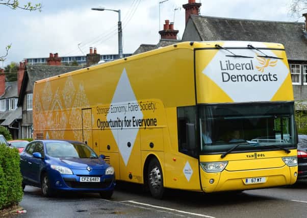 The Liberal Democrat battle bus carrying Deputy Prime Minister Nick Glegg in Glasgow. Picture: Getty