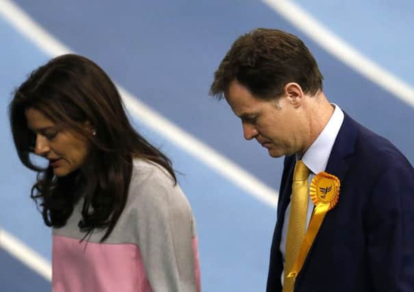 Nick Clegg and wife Miriam Gonzalez Durantez leave after winning his Sheffield Hallam seat. Picture: AP