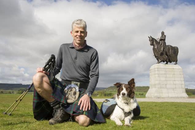 Gregor Ewing and his collie Meg at the Bannockburn monument to the Bruce. Picture: Ian Rutherford