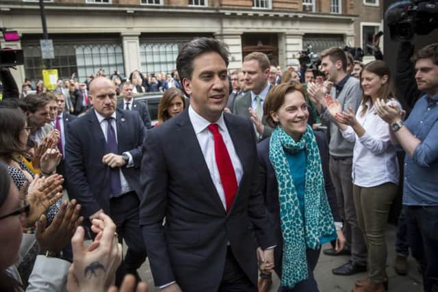 Labour Party leader Ed Miliband and his wife Justine Thornton are greeted by supporters at Labour party headquarters before his resignation speech. Picture: Getty