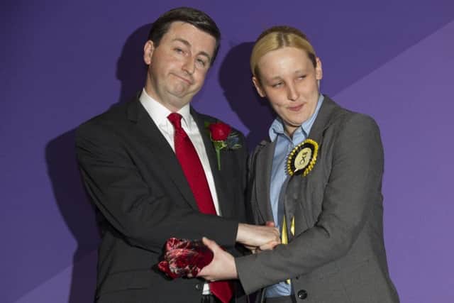 Newly-elected  member of Parliament, Mhairi Black, Britain's youngest member of parliament since 1667, greets Labour candidate Douglas Alexander. Picture: Getty