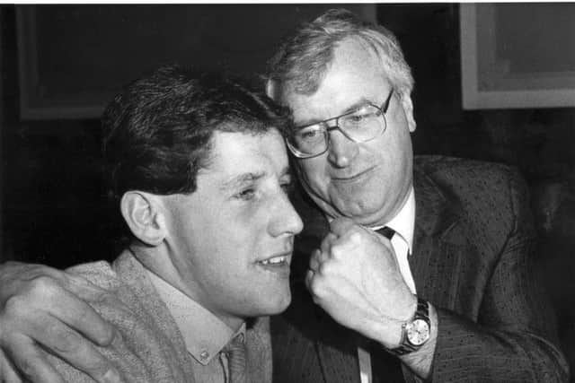 Ted McMinn with Jock Wallace as he signs for Rangers. Picture: Allan Milligan