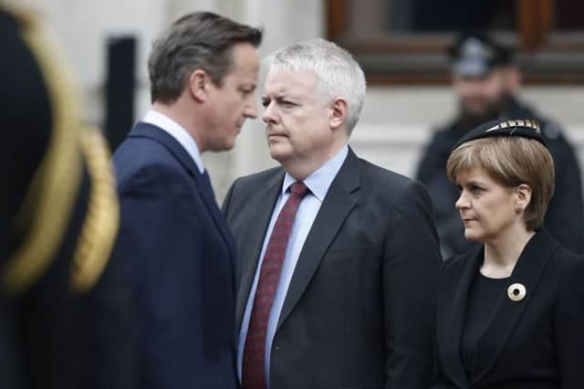 There is little sign of warmth as David Cameron walks past Nicola Sturgeon at the VE Day commemoration. Picture: Getty