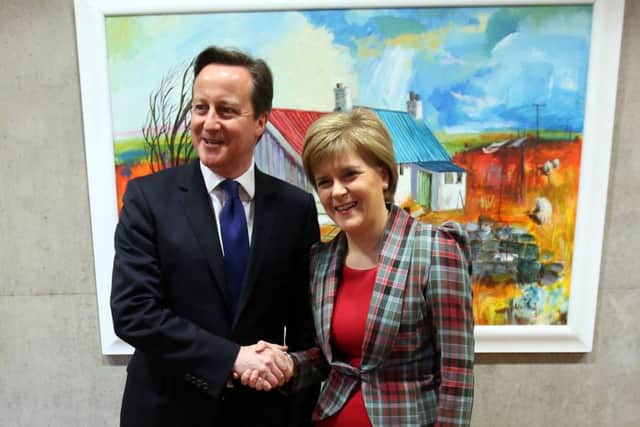 Nicola Sturgeon and David Cameron both emerged as election winners. Picture: PA