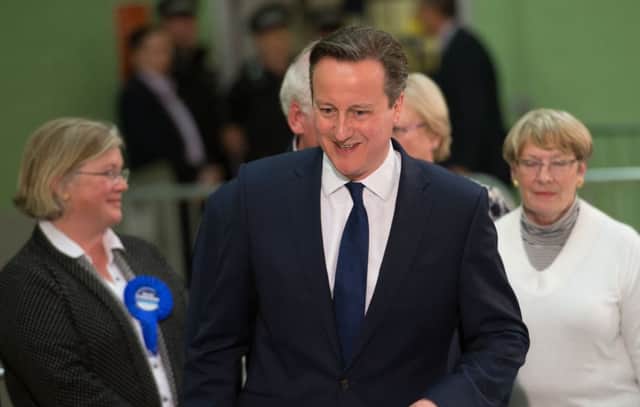 David Cameron arrives to see the count of his constituency. Picture: PA