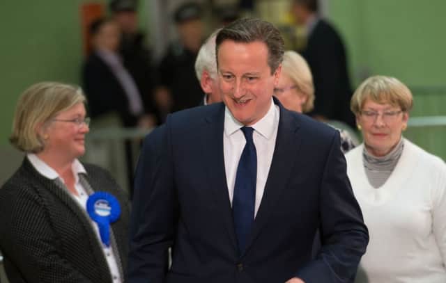 David Cameron arrives to see the count of his constituency. Picture: PA