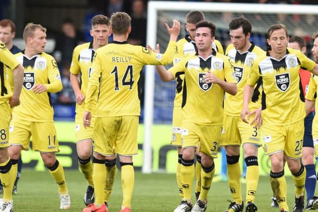 St Mirren's Stephen Mallan, centre, celebrates as he equalises for his side. Picture: SNS