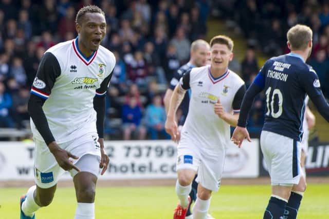 Inverness' Edward Ofere wheels away to celebrate his goal. Picture: SNS