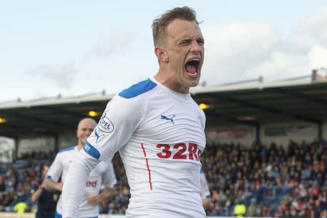 Dean Shiels celebrates netting the winning goal on the night. Picture: PA