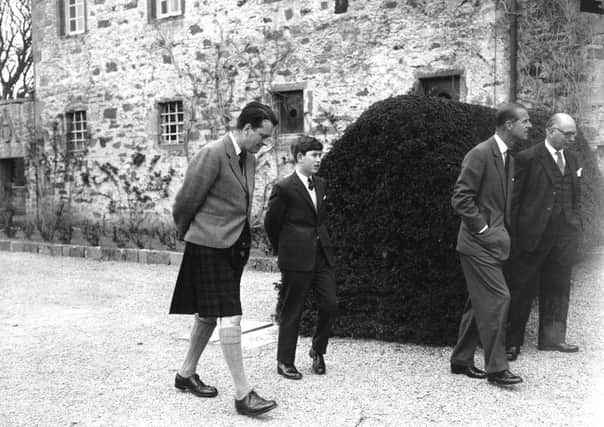 Prince Charles, pictured with his father and teachers, became a pupil at Gordonstoun school in Moray. Picture: Hulton Getty