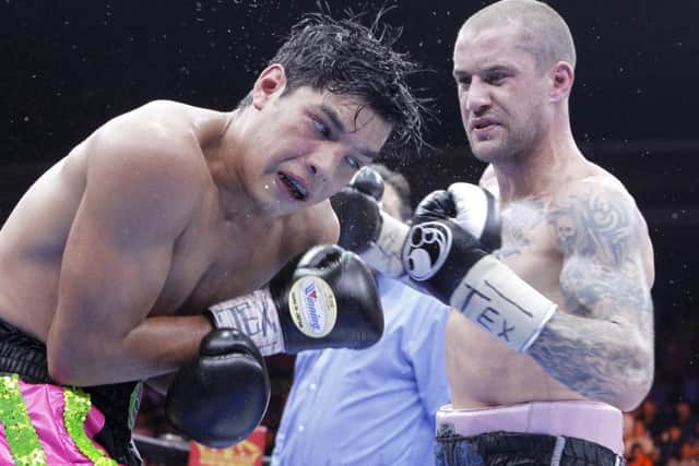 Ricky Burns lands a blow in the last round of the fight but was already well behind on the judges' scorecards. Picture: AP