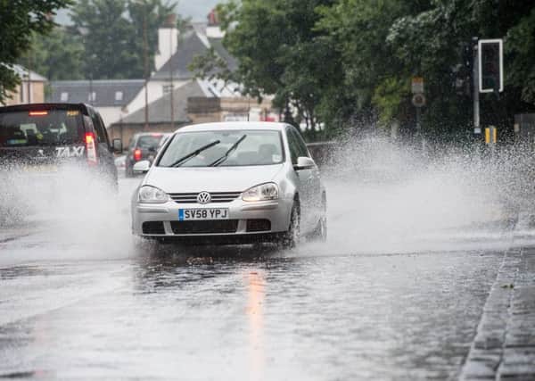 The agency issued a yellow - be aware - alert for up to 50mm (2in) of rain in the Borders and Dumfries and Galloway. Picture: TSPL