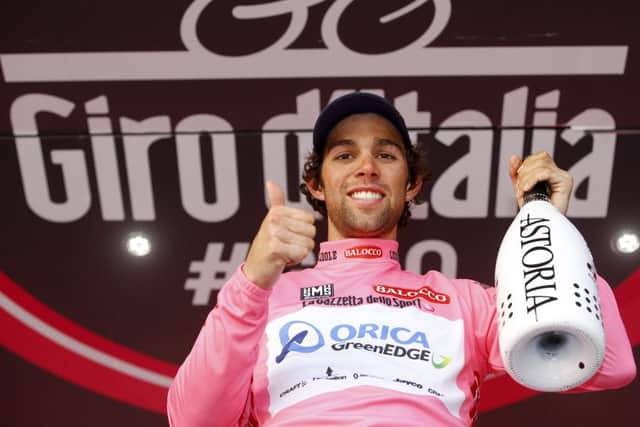 Australian Michael Matthews celebrates after claiming the leader's pink jersey. Picture: AFP/Getty