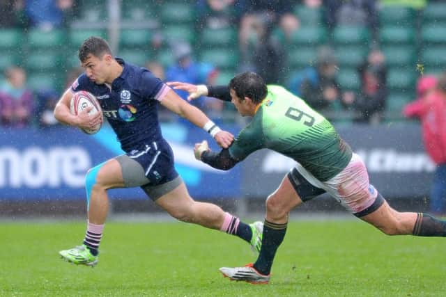 Scotland's Damien Hoyland bursts clear against South Africa. Picture: Jane Barlow