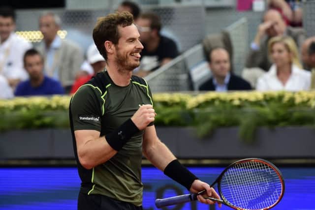 Andy Murray shows his delight after winning the Madrid Open last night defeating home-favourite Rafa Nadal 6-3, 6-2. Picture: Getty