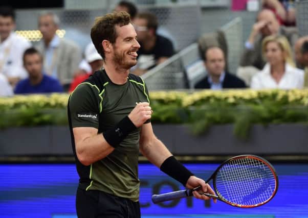 Andy Murray shows his delight after winning the Madrid Open last night defeating home-favourite Rafa Nadal 6-3, 6-2. Picture: Getty