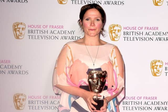 Jessica Hynes with the Female Performance in a Comedy Programme Award for W1A. Picture: PA