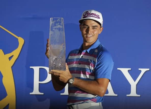 Rickie Fowler won in a sudden death play-off against Kevin Kisner to take home The Players Championship trophy. Picture: AP