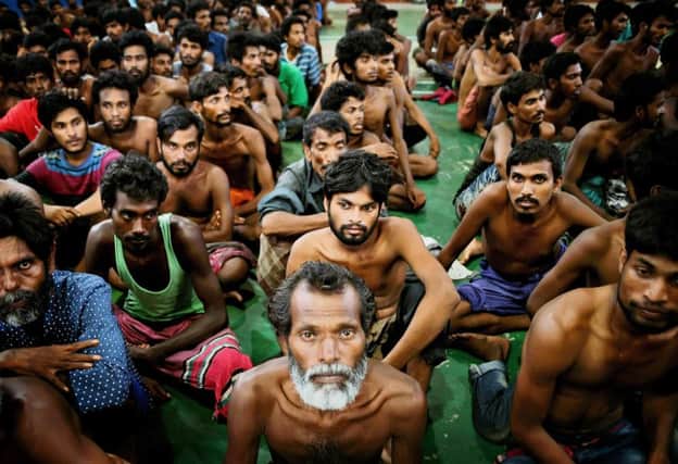 Bangladeshi migrants in Langkawi after coming ashore in Malaysia. Picture: Getty
