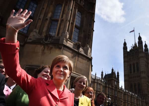 Nicola Sturgeon pictured with the 56 SNP MPs at Westminster. Picture: Getty