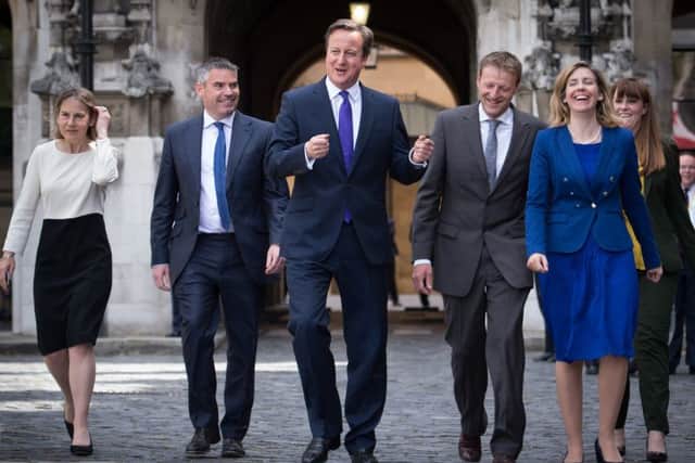 David Cameron with new MPs (L-R) Tania Mathias, Craig Tracey, Derek Thomas, Andrea Jenkyns and Kelly Tolhurst. Picture: Getty