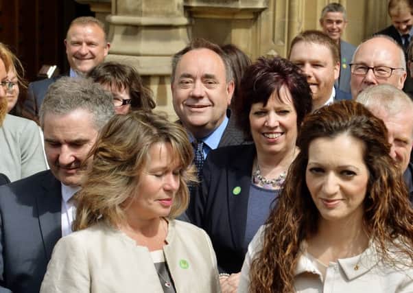 Former first minister Alex Salmond, centre, at Westminster. Picture: PA