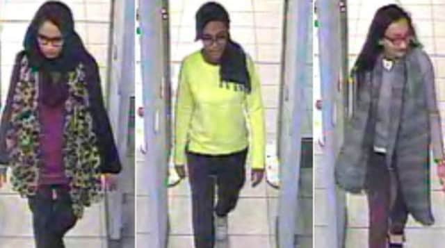 (Left to right) Kadiza Sultana, Amira Abase and Shamima Begum disappeared from their homes in east London in February. Picture: AFP/Getty Images