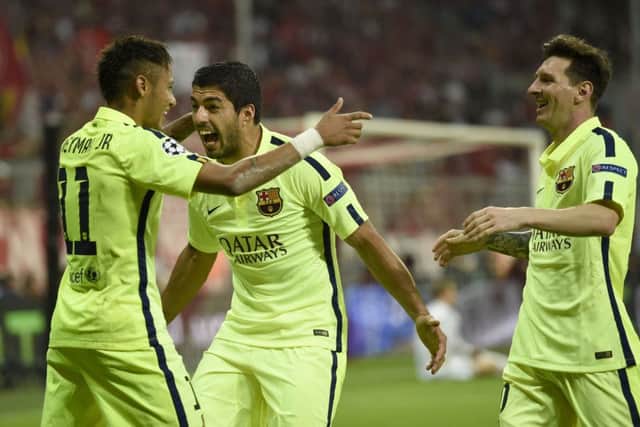 Neymar, Luis Suarez and Lionel Messi celebrate the Brazilian scoring Barca's second goal. Picture: AFP