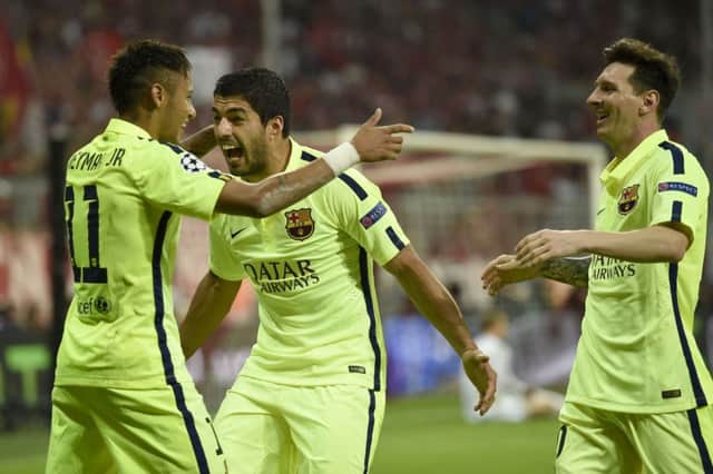 Neymar, Luis Suarez and Lionel Messi celebrate the Brazilian scoring Barca's second goal. Picture: AFP