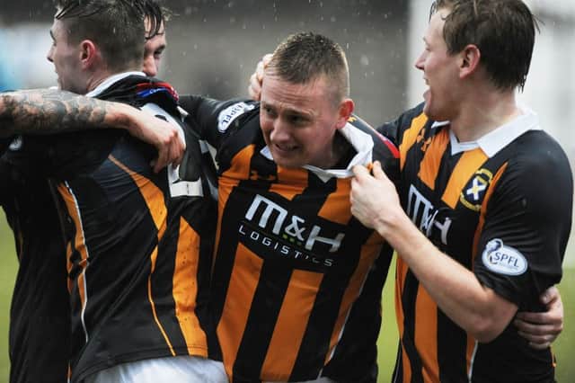 Derek Riordan celebrates a winning goal for East Fife, but the former Hibernian and Celtic striker has been released by the club. Picture: George McLuskie