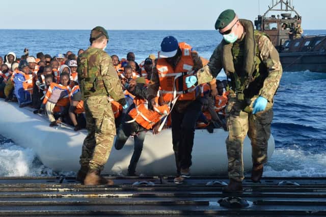The Royal Navy aid the humanitarian effort in the Mediterranean but other UK help for migrants is negligible. Picture: AP