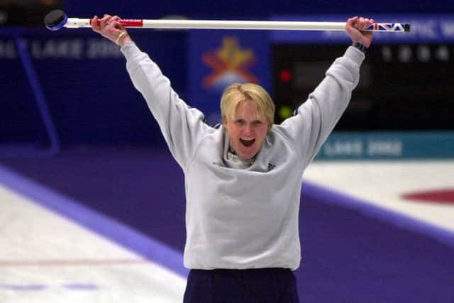 Howie celebrates delivering the winning shot at the 2002 Winter Olympics. Picture: AP